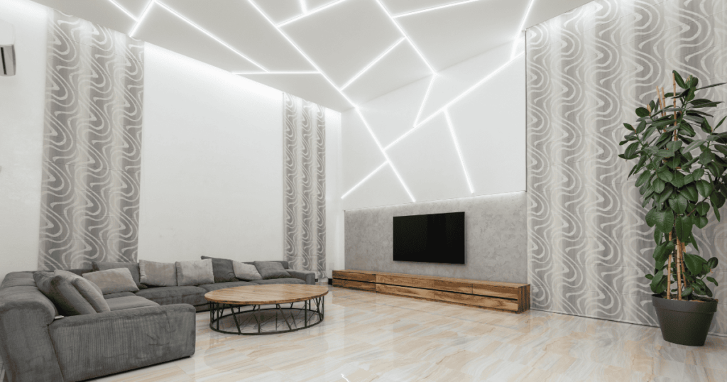 an image of a modern interior design with edgy lighting fixtures that cascade down the wall from the ceiling in asymmetrical lines of white light.